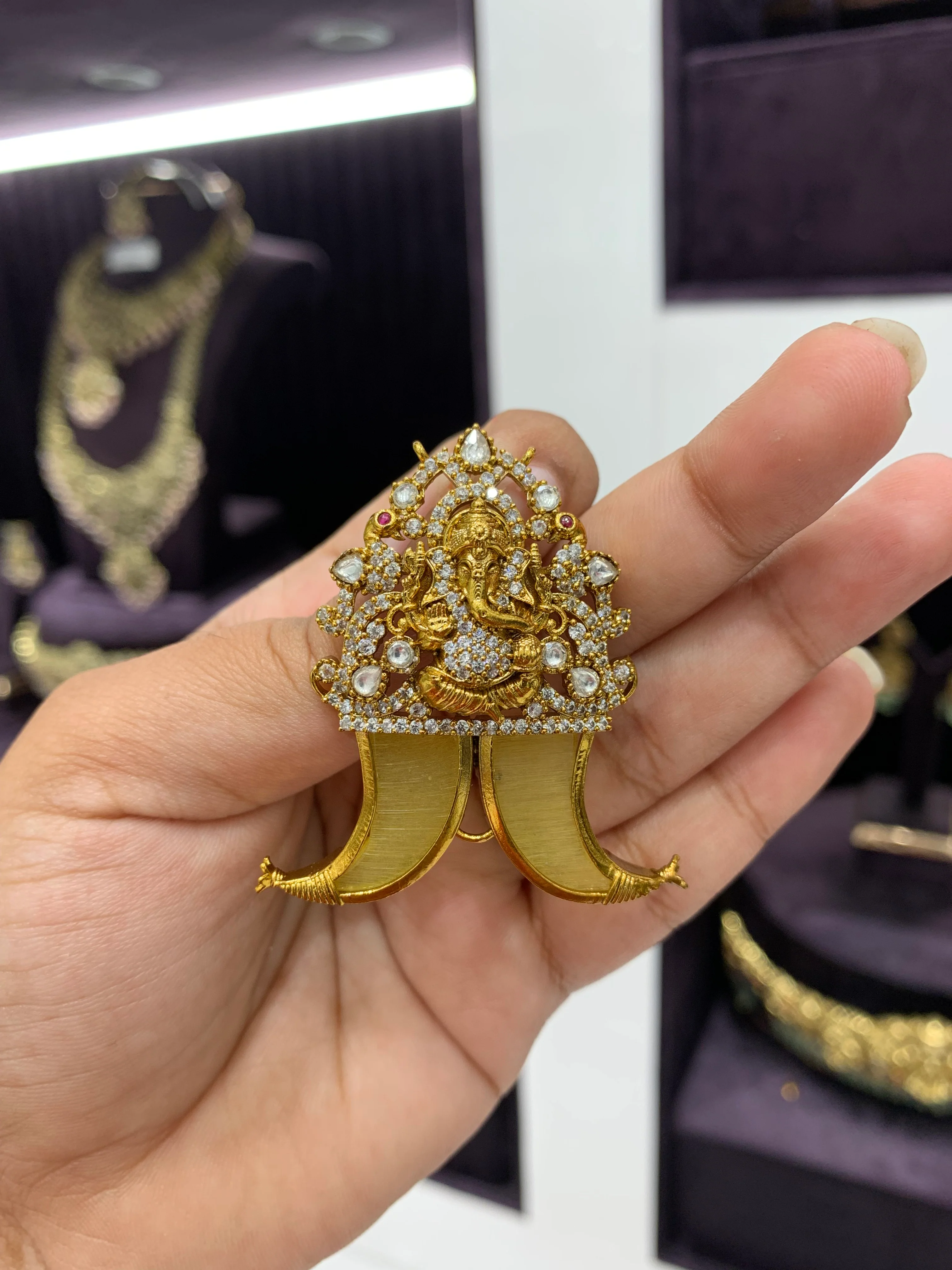 Beautiful ganesh tiger nail with back hook